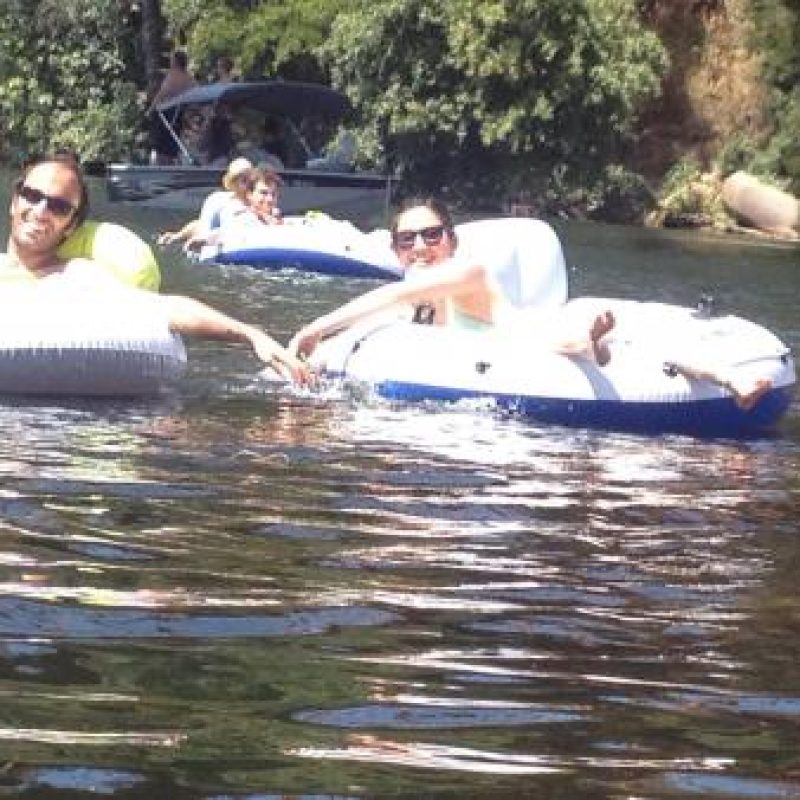 lab members tubing in the American River