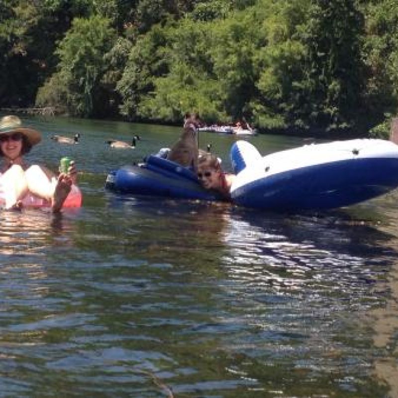 lab members tubing in the American River