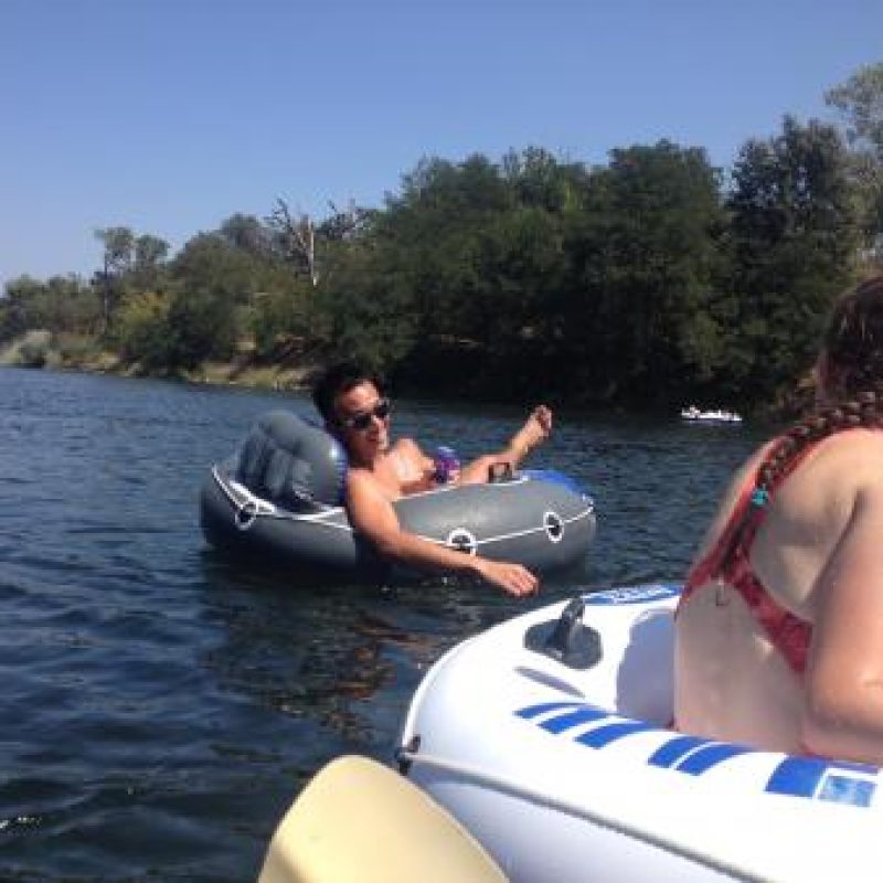 lab members tubing in the American River