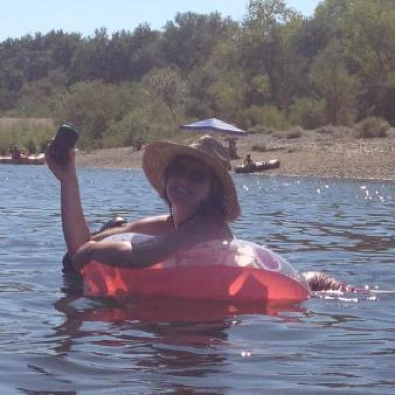Woman in a floatie in the American River