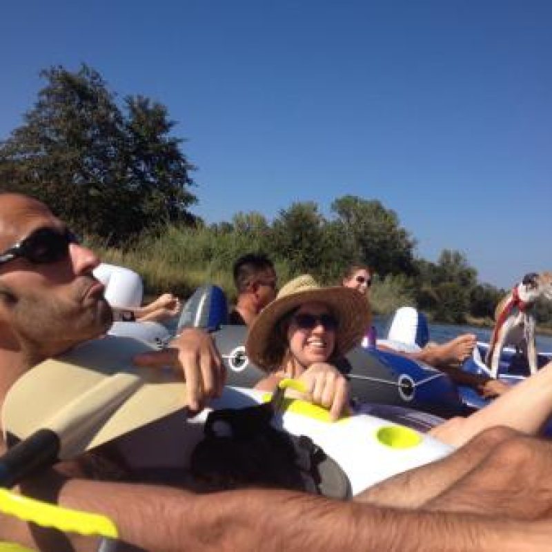lab members tubing in the American River